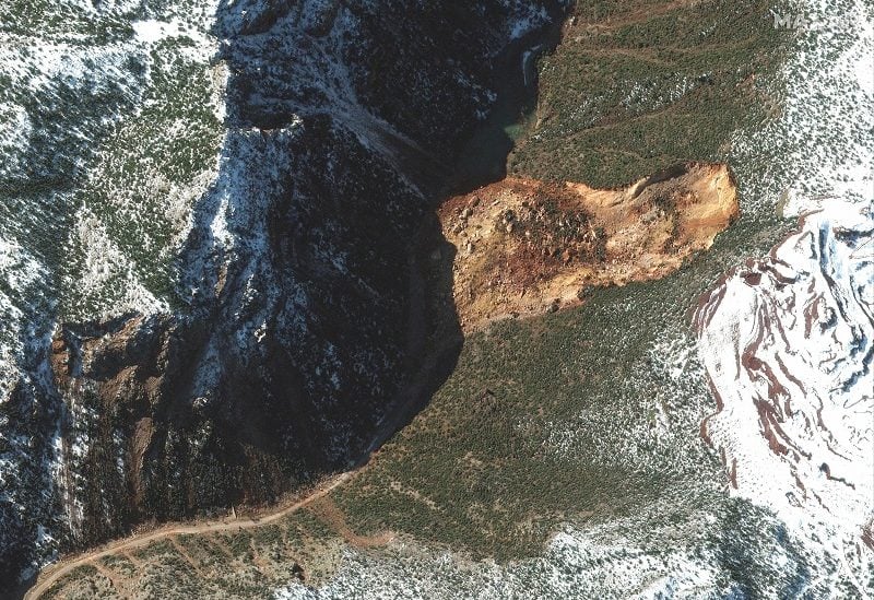 A satellite image shows a large landslide blocking a mountain road after an earthquake in Izlahiye, Turkey February 13, 2023. Maxar Technology/Handout via REUTERS ATTENTION EDITORS - THIS IMAGE HAS BEEN SUPPLIED BY A THIRD PARTY. MANDATORY CREDIT. NO RESALES. NO ARCHIVES. DO NOT OBSCURE LOGO.