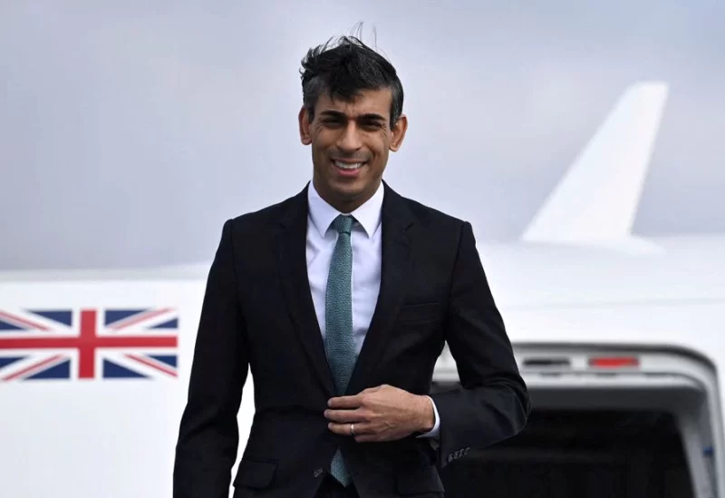 British Prime Minister Rishi Sunak gets off his plane after his arrival on February 18, 2023 at the airport in Munich, southern Germany, where he will attend the Munich Security Conference (MSC). - BEN STANSALL/Pool via REUTERS
