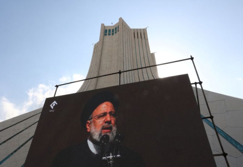 Iranian president Ebrahim Raisi is seen on a display during the 44th anniversary of the Islamic Revolution in Tehran, Iran, February 11, 2023 - REUTERS