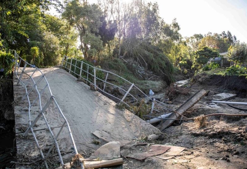 A general view of a damaged bridge after a small creek bursts its bank causing houses to flood in Havelock North, New Zealand. February 18, 2023. New Zealand Defence Force/Handout via REUTERS