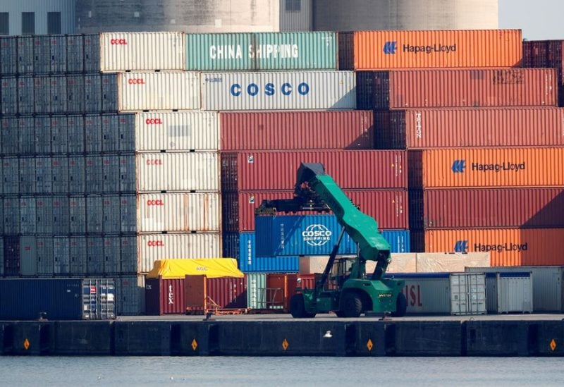 Shipping containers of China Shipping and China Ocean Shipping Company (COSCO) are stacked up at the port of Antwerp, Belgium July 26, 2018. REUTERS