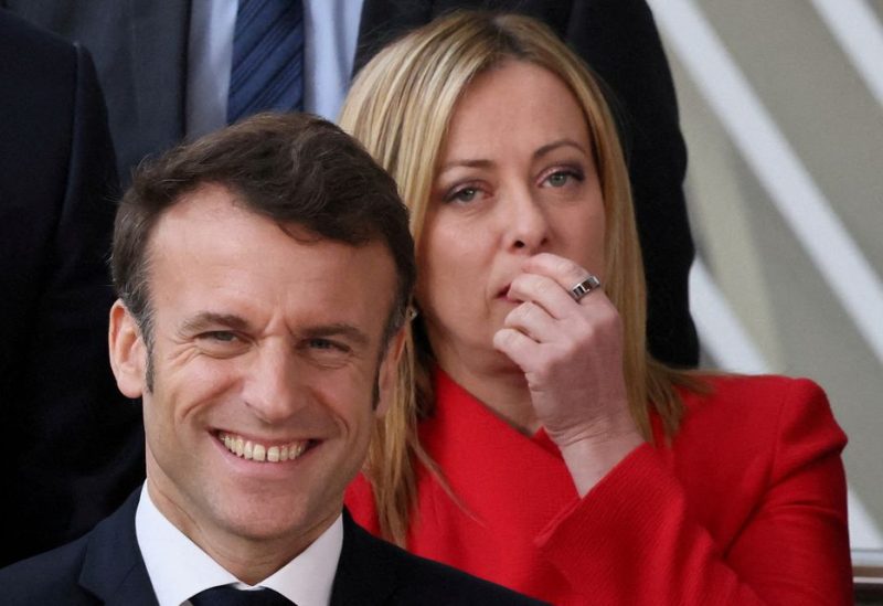 France's President Emmanuel Macron and Italy's Prime Minister Giorgia Meloni pose for a family photo as they attend the European leaders summit in Brussels, Belgium February 9, 2023. REUTERS