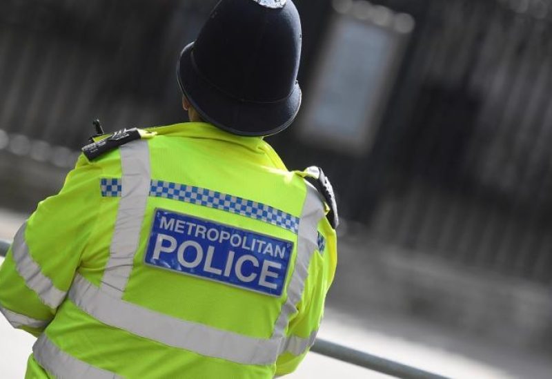 A Metropolitan Police officer stands on duty in Westminster, London, Britain, October 1, 2021. (Reuters)