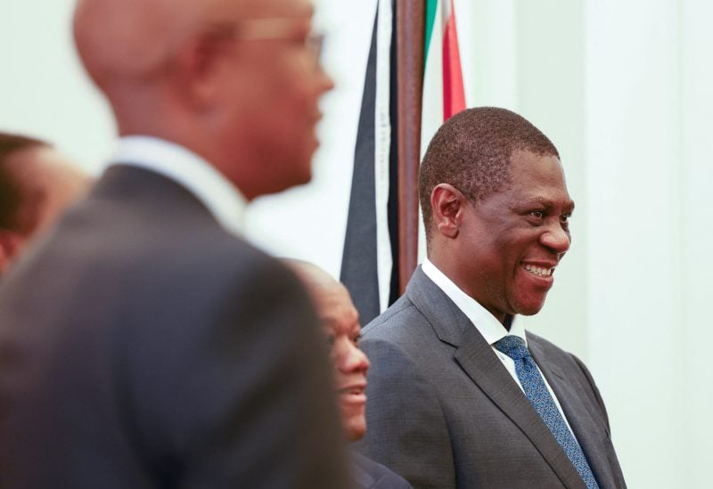 South Africa's new member of parliament, Paul Mashatile smiles after his sworn in ceremony following his election at the African National Congress national conference in December - REUTERS