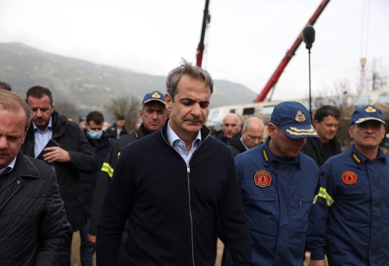 Greek Prime Minister Kyriakos Mitsotakis visits the site of a crash, where two trains collided, near the city of Larissa, Greece, March 1, 2023. REUTERS/Alexandros Avramidis
