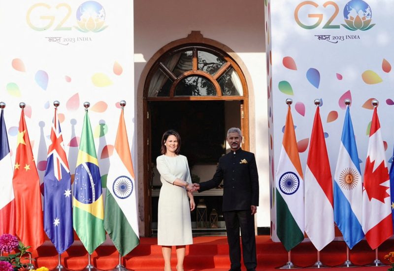 German Foreign Minister Annalena Baerbock and India's Foreign Minister Subrahmanyam Jaishankar shake hands before the start of G20 foreign ministers' meeting in New Delhi, India, March 2, 2023. India's Ministry of External Affairs/Handout via REUTERS