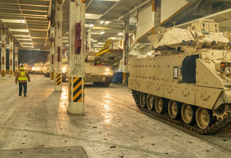 A convoy of Ukraine-bound Bradley Fighting Vehicles load onto the carrier ARC Integrity at the Transportation Core Dock in North Charleston, South Carolina, U.S. January 25, 2023. U.S. Transportation Command/Oz Suguitan/Handout via REUTERS