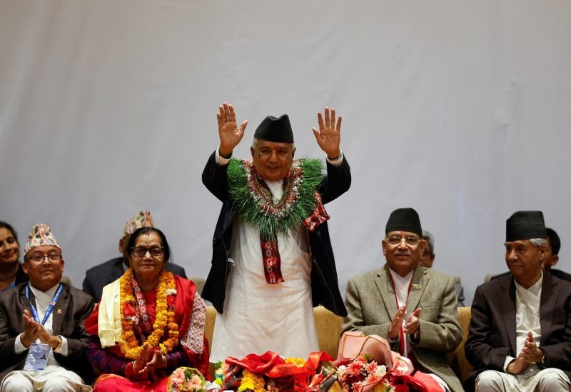 Newly-elected President Ram Chandra Paudel waves towards the media after being elected as the third president of Nepal at the Parliament in Kathmandu, Nepal March 9, 2023. REUTERS/Navesh Chitrakar