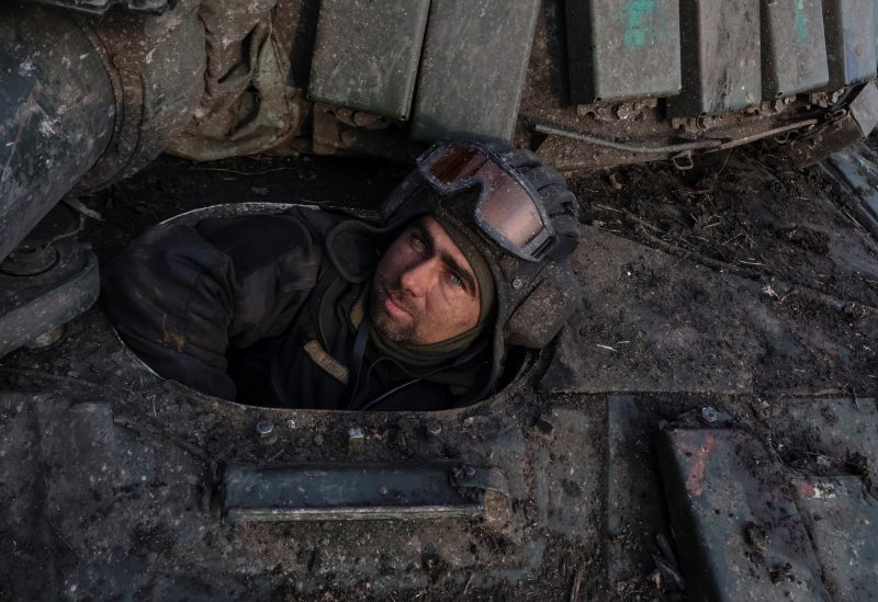 A Ukrainian serviceman looks on from a tank near the frontline town of Bakhmut, amid Russia's attack on Ukraine, in Donetsk region, Ukraine March 7, 2023. Radio Free Europe/Radio Liberty/Serhii Nuzhnenko via REUTERS
