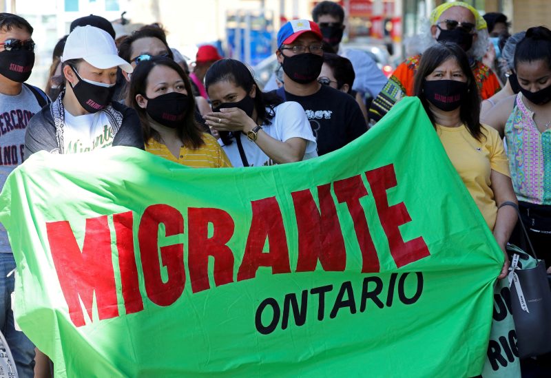 Migrants, refugees, undocumented workers and their supporters rally outside the office Canada's Immigration Minister Marco Mendicino in Toronto, Ontario, Canada July 4, 2020. REUTERS/Chris Helgren//File Photo