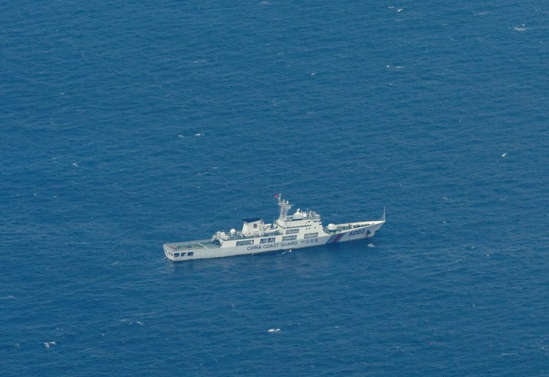 A Chinese Coast Guard vessel is pictured near the Philippine-occupied Thitu Island, in the disputed Spratly Islands, South China Sea, March 9, 2023. REUTERS/Eloisa Lopez/File Photo