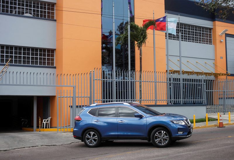 A vehicle leaves the Taiwan Embassy after Honduras has given Taiwan 30 days to vacate its embassy after severing relations with Taiwan in favor of China, in Tegucigalpa, Honduras March 26, 2023. REUTERS/Fredy Rodriguez