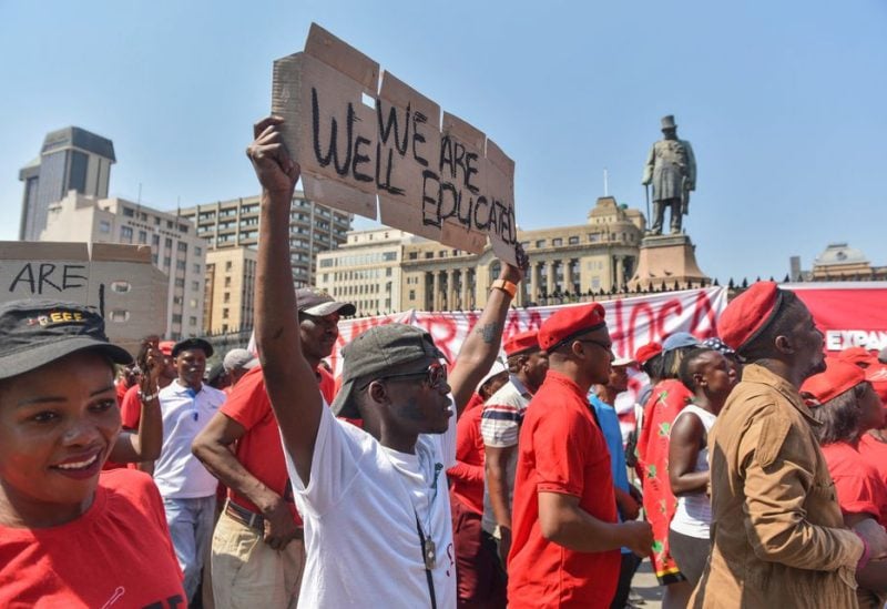 Members of the political party, Economic Freedom Fighters (EFF), gather at Church Square after calling for a "National Shutdown" and demanding resignation of President Cyril Ramaphosa in Pretoria, South Africa March 20, 2023 - REUTERS