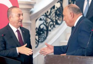 Turkish Foreign Minister Mevlut Cavusoglu and Egyptian Foreign Minister Sameh Shoukry (AP)