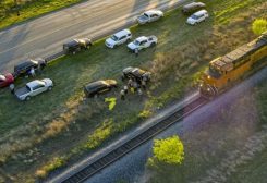 Officials investigate the scene where migrants were found trapped in a train car, Friday, March 24, 2023 in Ulvalde, Texas. (William Luther / Associated Press)