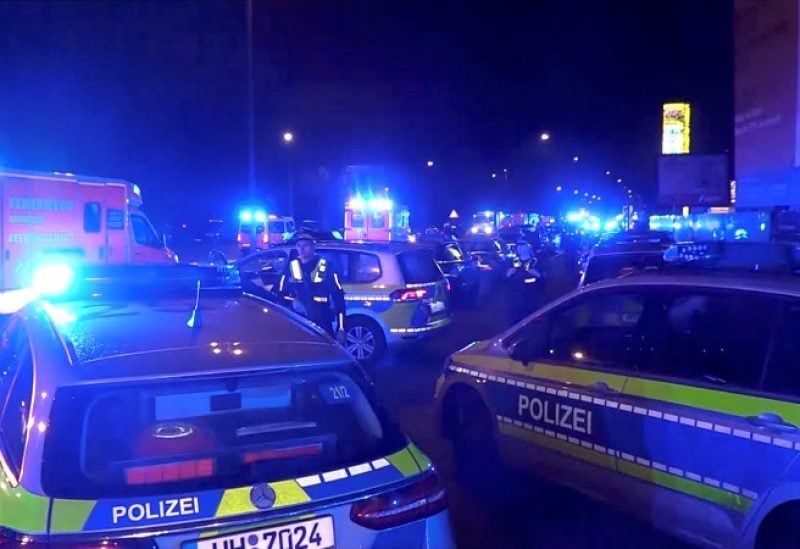 Police secure the area following a deadly shooting in Hamburg, Germany, March 9, 2023 in this still image taken from video. NONSTOP NEWS via Reuters TV/Handout via REUTERS THIS IMAGE HAS BEEN SUPPLIED BY A THIRD PARTY