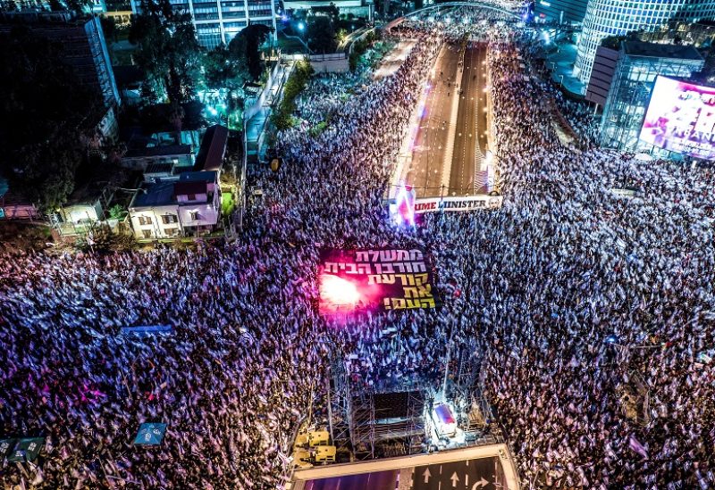 FILE PHOTO: An aerial view shows Israelis protesting, as Israeli Prime Minister Benjamin Netanyahu's nationalist coalition government presses on with its judicial overhaul, in Tel Aviv, Israel March 25, 2023. REUTERS/Oren Alon/File Photo