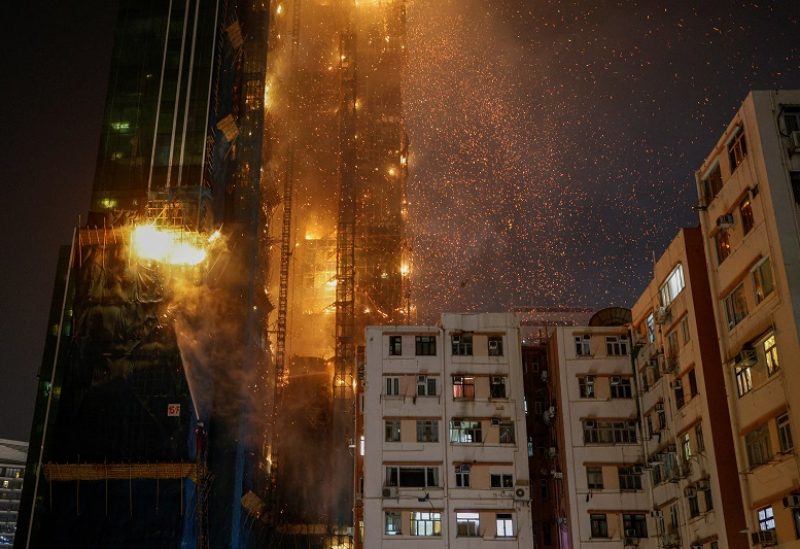 An under-construction skyscraper is seen on fire at Tsim Sha Tsui in Hong Kong, China March 3, 2023. REUTERS/Tyrone Siu