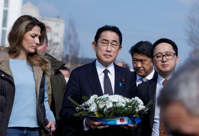 Japanese Prime Minister Fumio Kishida visits a site of a mass grave, in the town of Bucha, amid Russia's attack on Ukraine, outside of Kyiv, Ukraine March 21, 2023. REUTERS
