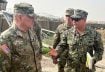 U.S. Joint Chiefs Chair Army General Mark Milley speaks with U.S. forces in Syria during an unannounced visit, at a U.S. military base in Northeast Syria, March 4, 2023. REUTERS