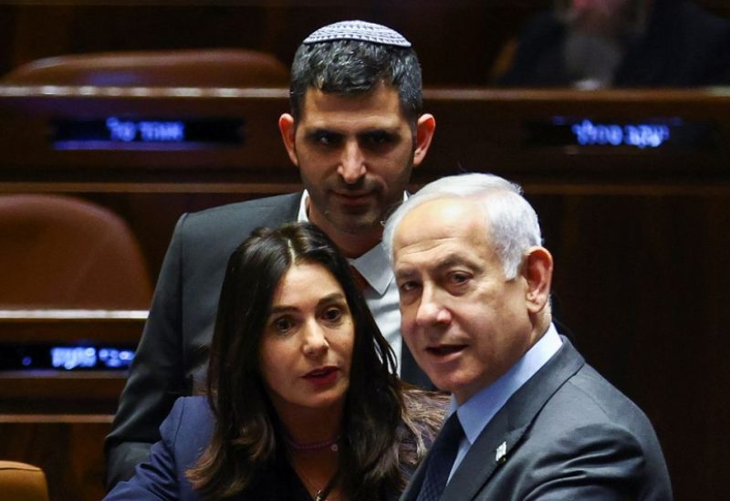 Israeli Prime Minister Benjamin Netanyahu attends a meeting at the Knesset, Israel's parliament, amid demonstrations after he dismissed the defence minister as his nationalist coalition government presses on with its judicial overhaul, in Jerusalem, March 27, 2023. REUTERS