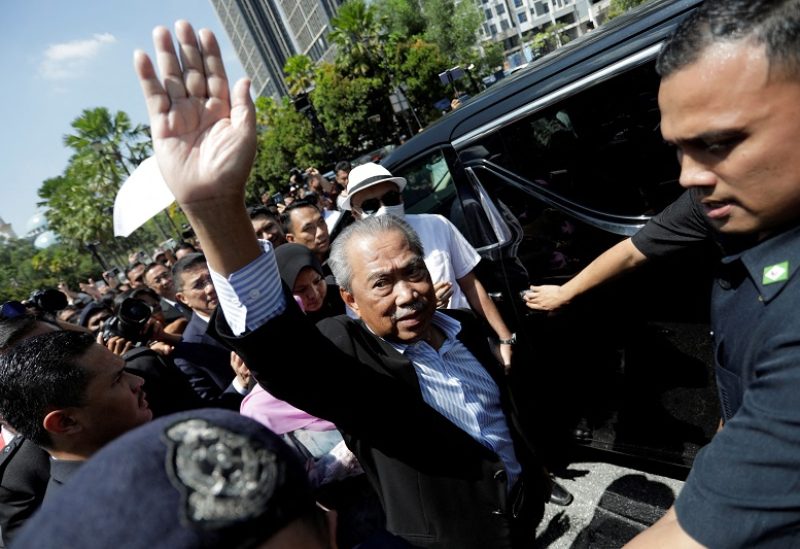 Former Malaysian Prime Minister Muhyiddin Yassin waves outside Kuala Lumpur Court Complex in Kuala Lumpur, Malaysia March 10, 2023. REUTERS/Hasnoor Hussain TPX IMAGES OF THE DAY