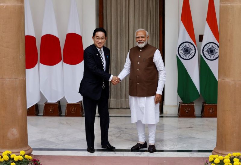 Japan Prime Minister Fumio Kishida shakes hands with his Indian counterpart Narendra Modi before their meeting at the Hyderabad House in New Delhi, India, March 20, 2023. REUTERS