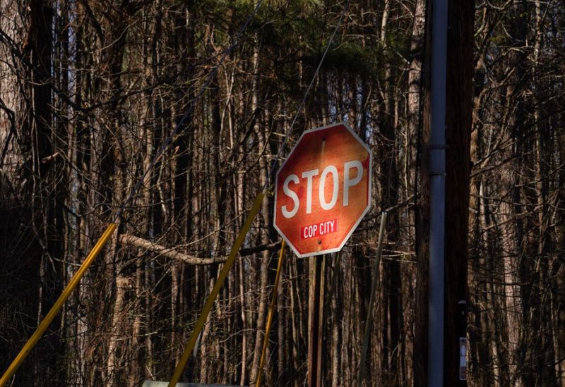 A stop sign sits on the outside of the forest as construction continues after a SWAT escort this morning at the construction site of a public safety training facility that activists have derided with the nickname "Cop City", in Atlanta, Georgia, U.S., February 6, 2023. REUTERS