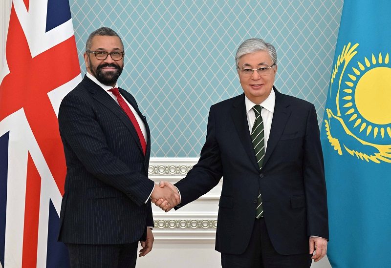 Kazakh President Kassym-Jomart Tokayev shakes hands with British Foreign Secretary James Cleverly during a meeting in Astana, Kazakhstan March 18, 2023. Press service of the President of Kazakhstan/Handout via REUTERS ATTENTION EDITORS - THIS IMAGE HAS BEEN SUPPLIED BY A THIRD PARTY. MANDATORY CREDIT.