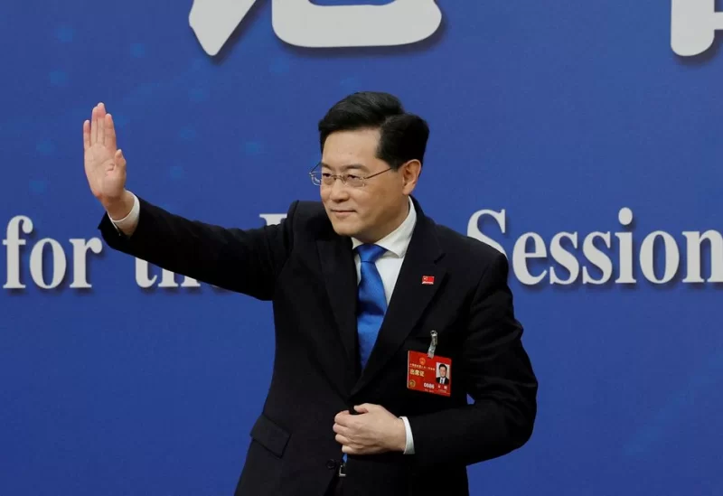 Chinese Foreign Minister Qin Gang waves at the end of a news conference on the sidelines of the National People's Congress (NPC) in Beijing, China March 7, 2023. REUTERS