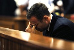 Olympic and Paralympic track star Oscar Pistorius reacts as Judge Thokozile Masipa (unseen) delivers her verdict at the North Gauteng High Court in Pretoria September 12, 2014 - REUTERS