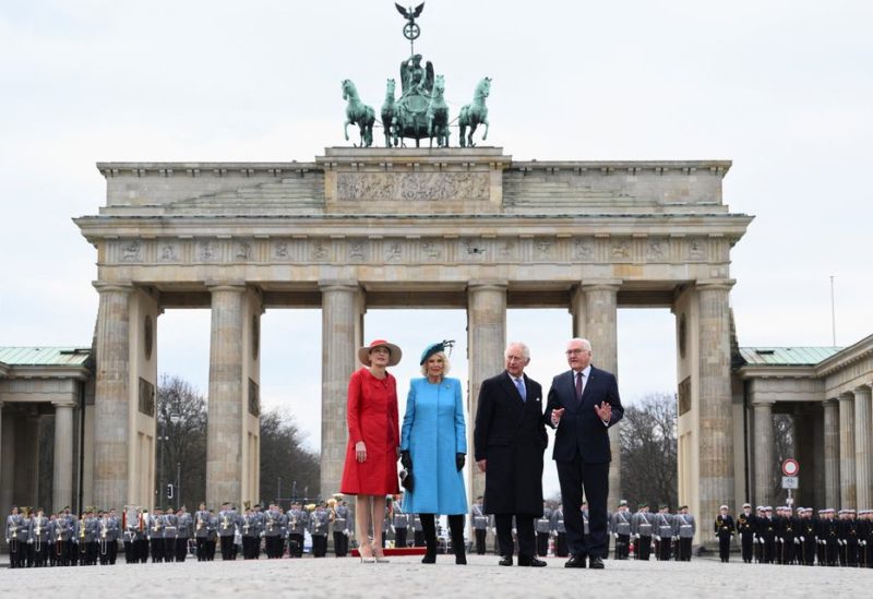 German President Frank-Walter Steinmeier, his wife Elke Buedenbender and Britain's King Charles and Camilla, the Queen Consort attend a welcome ceremony with military honors at Pariser Platz square in front of Brandenburg Gate in Berlin, Germany, March 29, 2023 - REUTERS