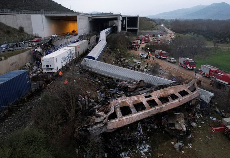 Rescue crews operate at the site of a crash, where two trains collided, near the city of Larissa, Greece, March 1, 2023. REUTERS/Alexandros Avramidis