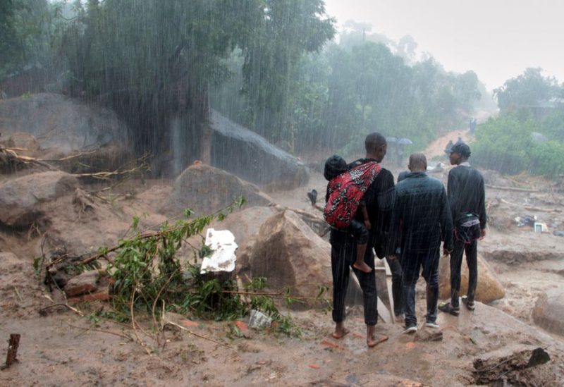 People look at the damage caused by Cyclone Freddy in Chilobwe, Blantyre, Malawi, March 13, 2023. REUTERS