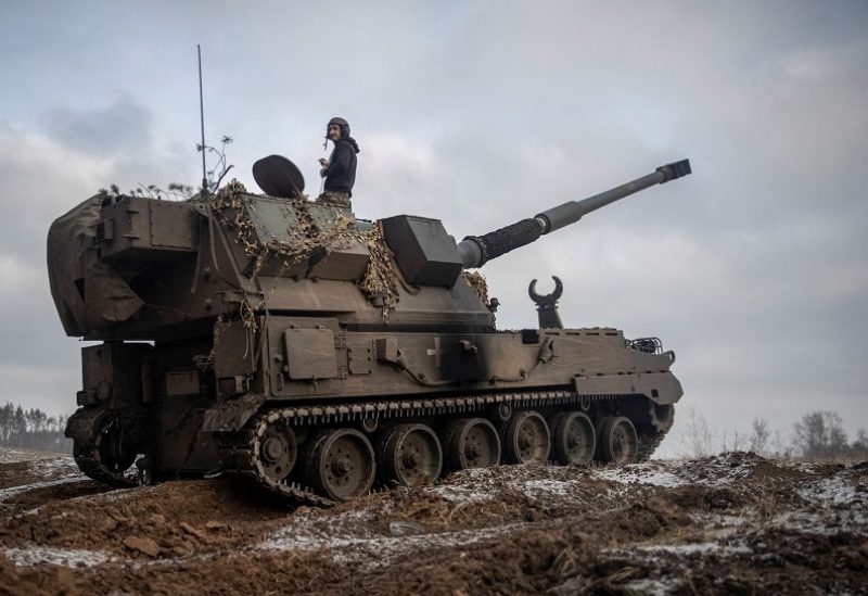 FILE PHOTO: Ukrainian servicemen prepare a Polish self-propelled howitzer Krab to fire toward Russian positions, amid Russia's attack on Ukraine, on a frontline in Donetsk region, Ukraine January 17, 2023. REUTERS/Oleksandr Ratushniak/File Photo