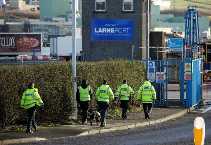 Police officers carry out a security sweep near the Port of Larne, Northern Ireland, Britain January 1, 2021. REUTERS