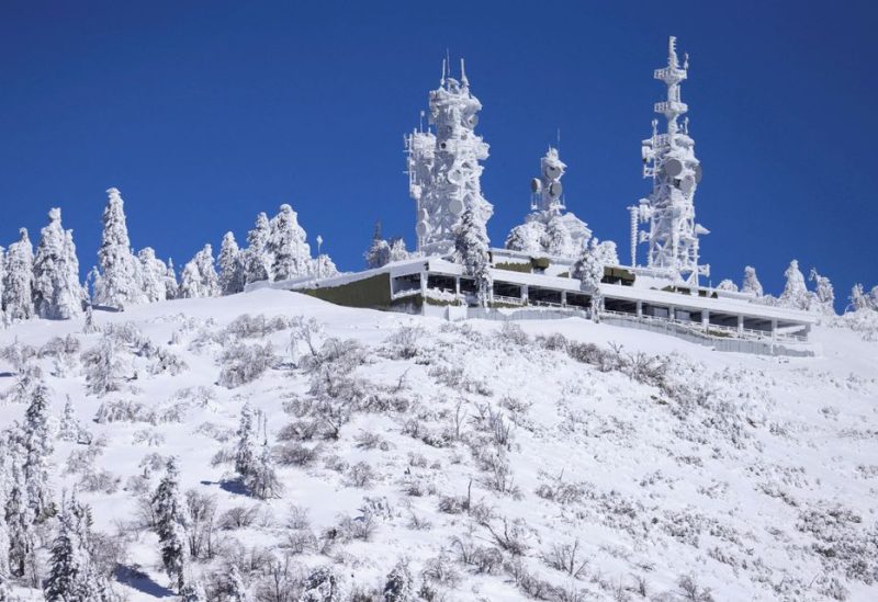 Ice covers communication towers as massive amounts of snow trap residents of mountain towns in San Bernadino County, Crestline, California, U.S. March 2, 2023. REUTERS