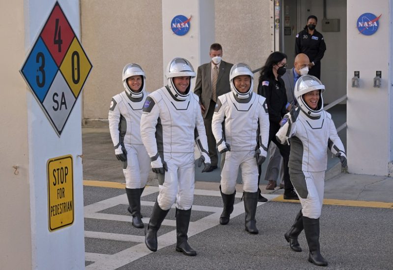 FILE PHOTO: NASA's Crew 5 members depart their crew quarters for launch aboard a SpaceX Falcon 9 rocket at the Kennedy Space Center in Cape Canaveral, Florida, U.S. October 5, 2022. REUTERS/Steve Nesius/File Photo