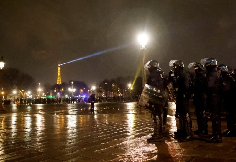 Gendarmerie members stand guard during a demonstration on Place de la Concorde to protest the use by French government of the article 49.3, a special clause in the French Constitution, to push the pensions reform bill through the National Assembly without a vote by lawmakers, in Paris, France, March 17, 2023. REUTERS/Gonzalo Fuentes TPX IMAGES OF THE DAY