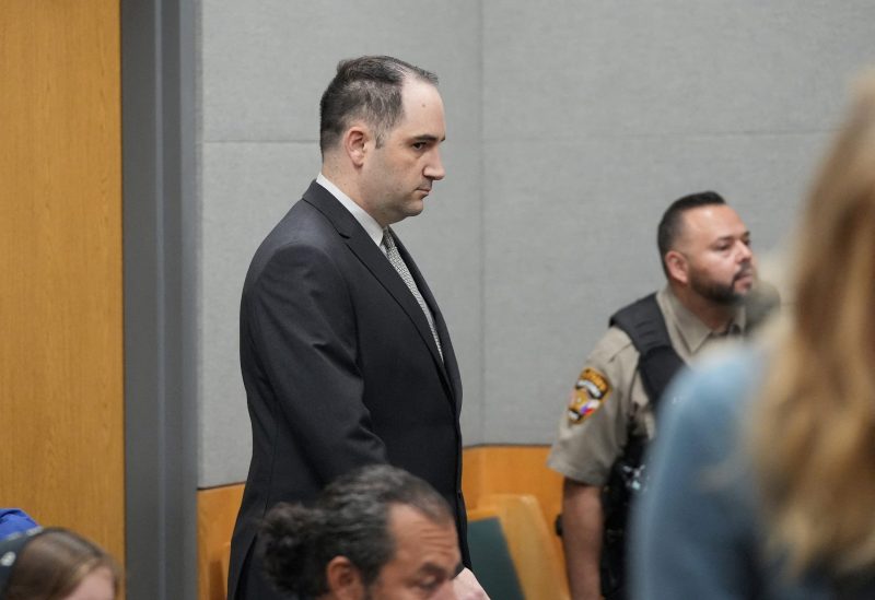 Daniel Perry walks into the courtroom moments before he was convicted of murder in the July 2020 shooting death of Garrett Foster at a Black Lives Matter protest, at the Blackwell-Thurman Criminal Justice Center in Austin, Texas, U.S. April 7, 2023. Jay Janner/USA Today Network via REUTERS Read less