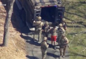 FBI agents arrest Jack Teixeira, an employee of the U.S. Air Force National Guard, in connection with an investigation into the leaks online of classified U.S. documents, outside a residence in this still image taken from video in North Dighton, Massachusetts, U.S., April 13, 2023. WCVB-TV via ABC via REUTERS