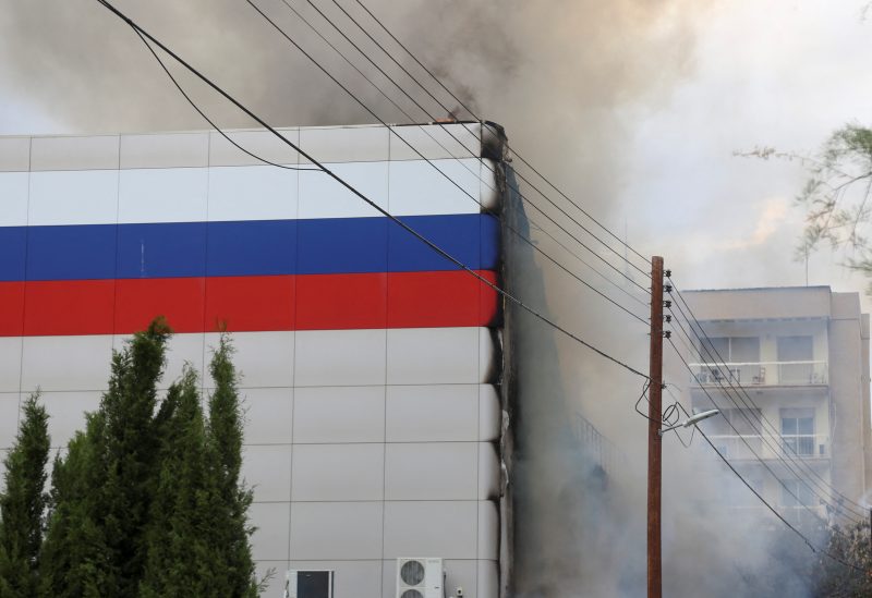 Smoke rises as a fire burns at the Russian cultural centre in Nicosia, Cyprus, April 26, 2023. REUTERS/George Christophorou