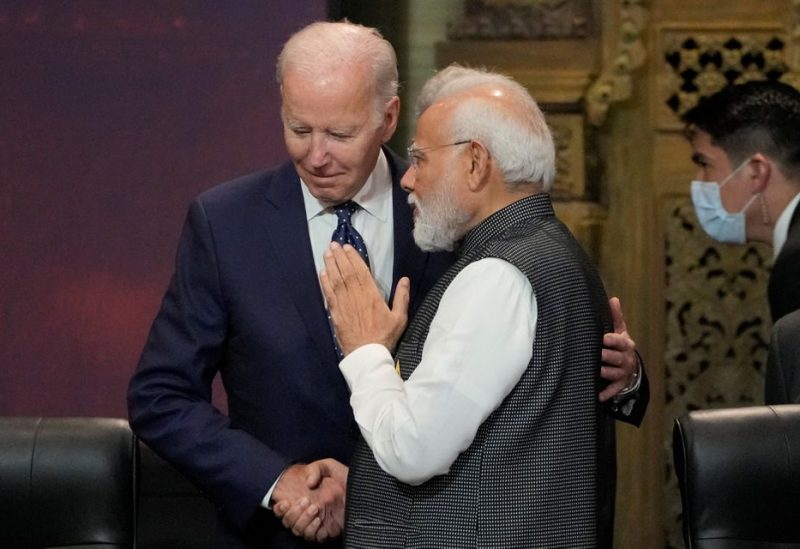 U.S. President Joe Biden, left, and India Prime Minister Narendra Modi talks during the G20 leaders summit in Nusa Dua, Bali, Indonesia, Tuesday, Nov. 15, 2022. Dita Alangkara/Pool via REUTERS
