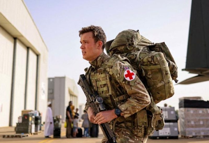 A member of the medical team from the Duke of Lancaster's Regiment is seen during the evacuation of British citizens, at Wadi Seidna airport, Sudan April 27, 2023.(UK MOD /Handout via Reuters)