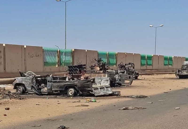 This picture shows destroyed vehicles in southern Khartoum on April 19, 2023 amid fighting between Sudan's regular army and paramilitaries following the collapse of a 24-hour truce. (AFP)