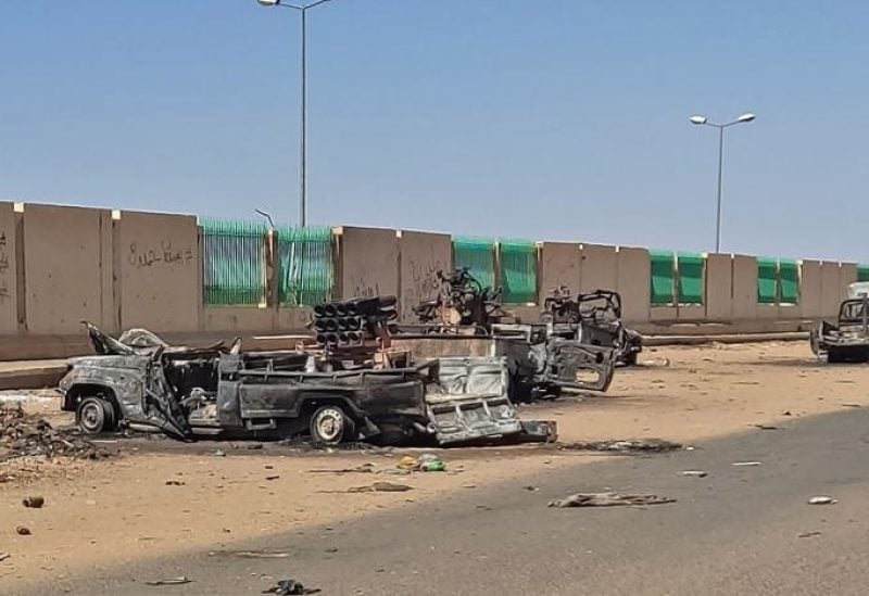 This picture shows destroyed vehicles in southern Khartoum on April 19, 2023 amid fighting between Sudan's regular army and paramilitaries following the collapse of a 24-hour truce. (AFP)