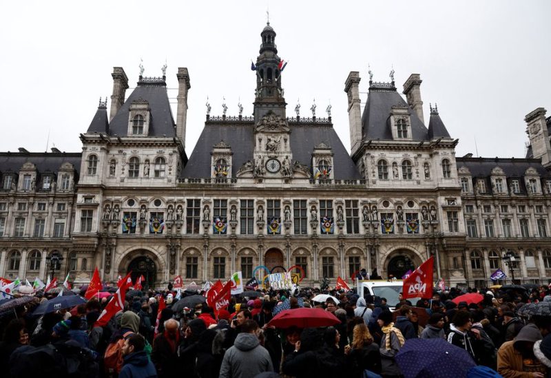 Protesters gather in front of the Paris City Hall after the Constitutional Council (Conseil Constitutionnel) approved most of the French government's pension reform, in Paris, France, April 14, 2023. REUTERS