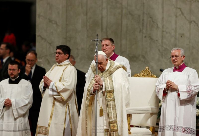 Pope Francis presides over the Easter Vigil in Saint Peter's Basilica at the Vatican, April 8, 2023. REUTERS