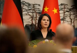 German Foreign Minister Annalena Baerbock speaks during a joint press conference with Chinese Foreign Minister Qin Gang (not pictured) at the Diaoyutai State Guesthouse in Beijing, China, April 14, 2023 - REUTERS