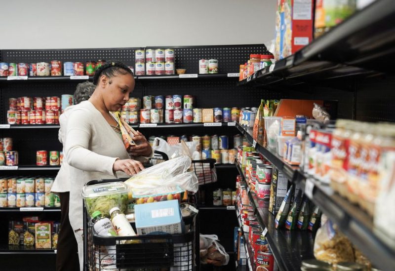 Sharawn White shops for food at The Community Assistance Center food pantry, in Atlanta, Georgia, U.S. April 12, 2023. REUTERS